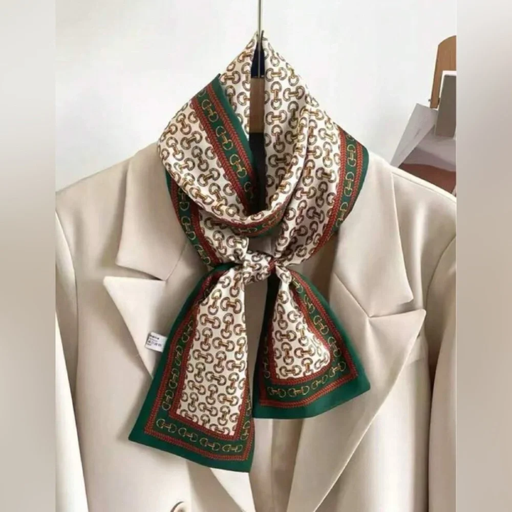 Elegant Cream Patterned Silk Scarf with Green Trim
